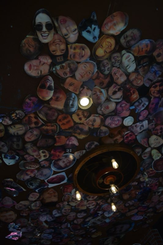 Photo-covered ceiling above the main bar at Balloons