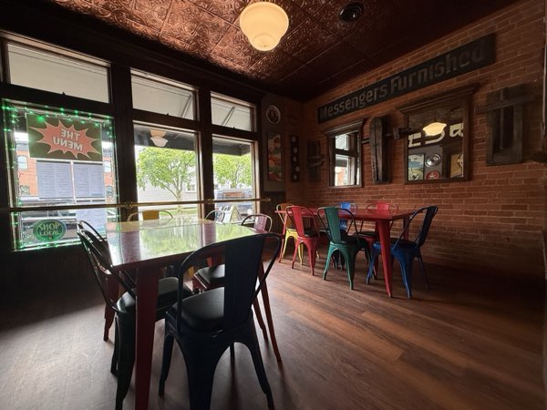 Front window dining seats at Balloons