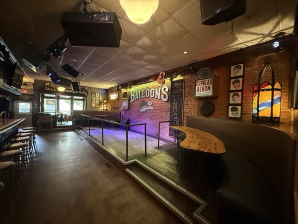 Stage and brick wall inside Balloons
